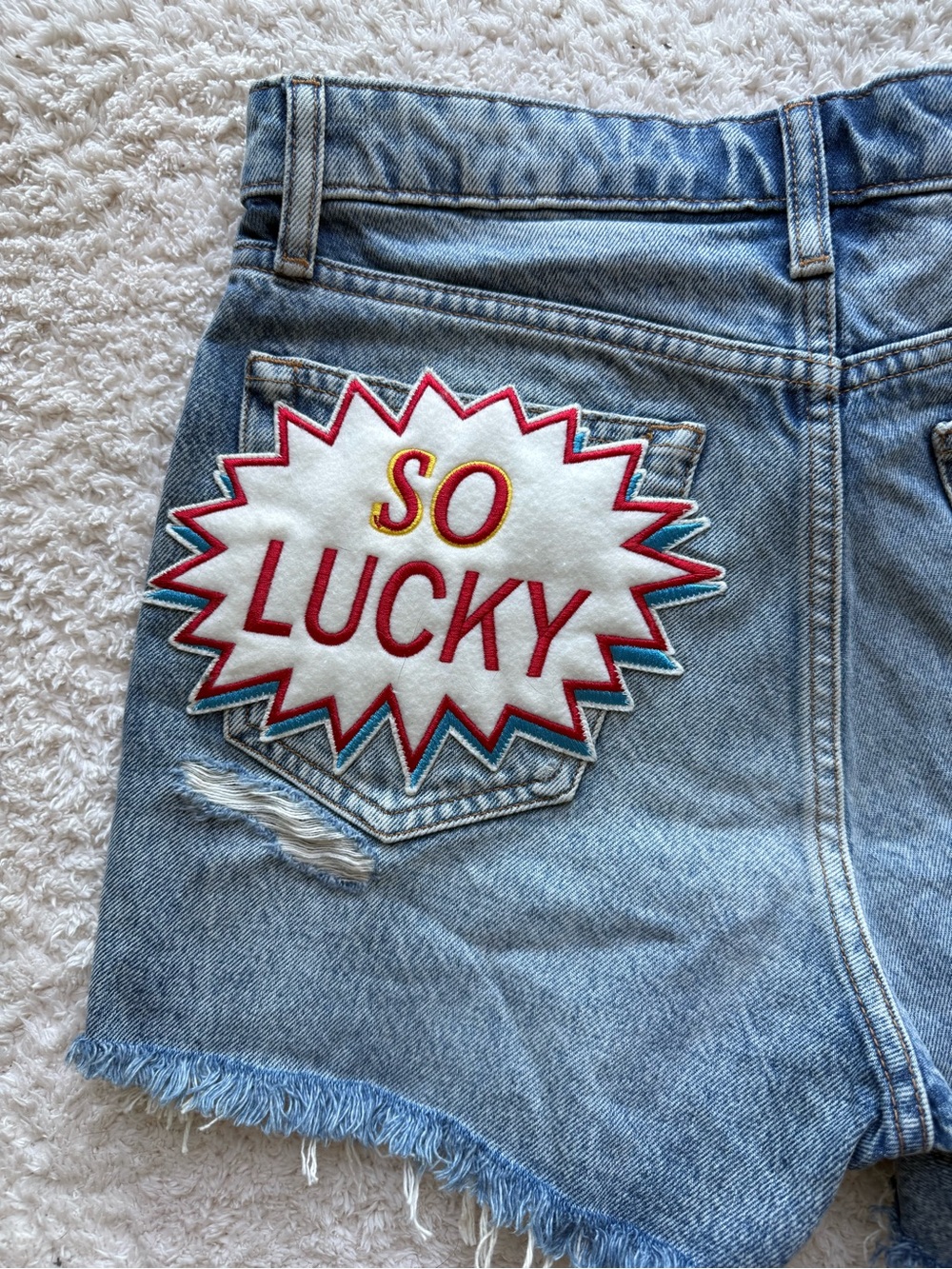Lucky Brand Light Blue Denim Shorts with 'So Lucky' Patch